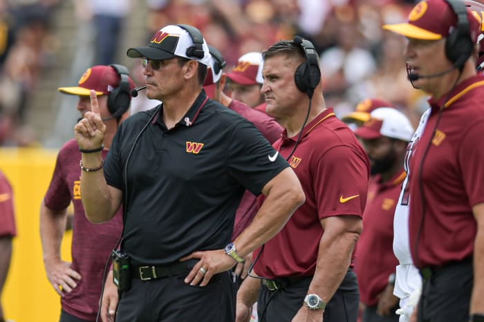 Washington Commanders head coach Ron Rivera looks onto the field dung the first half against the Arizona Cardinals at FedExField.